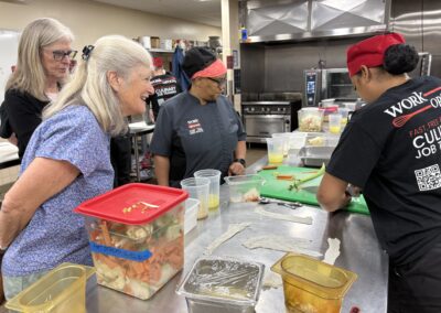 Work Options Executive Directive Julie Stone and Chris Clayton observing Culinary Skills